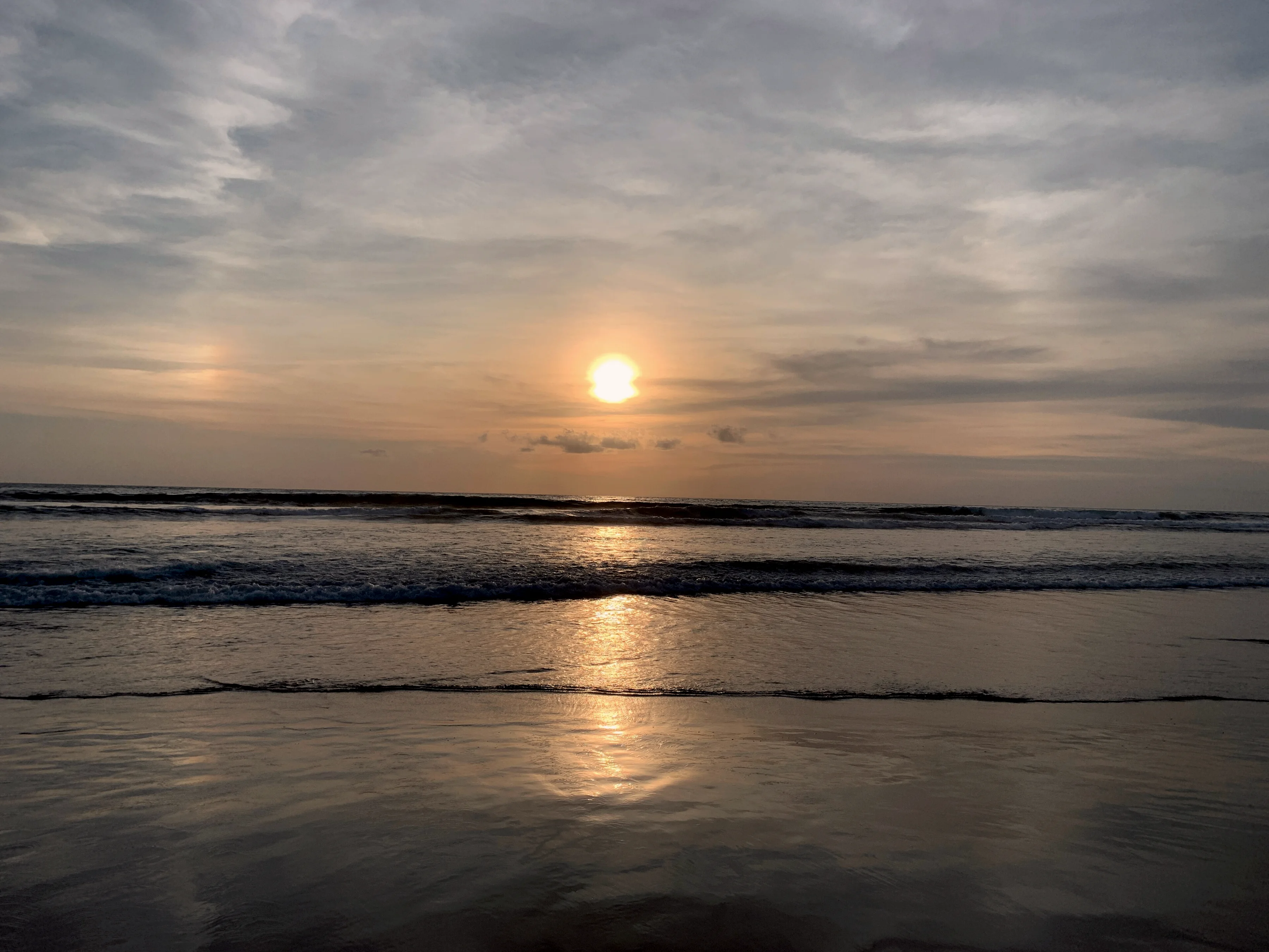 Coucher de soleil sur la mer à la plage de Double Six