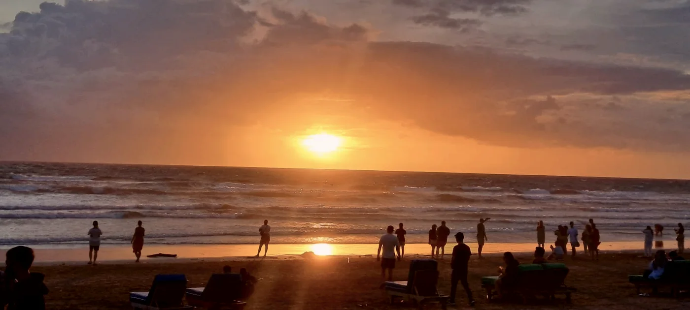 The sun going down over Seminyak beach